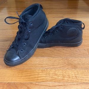Solid black Converse